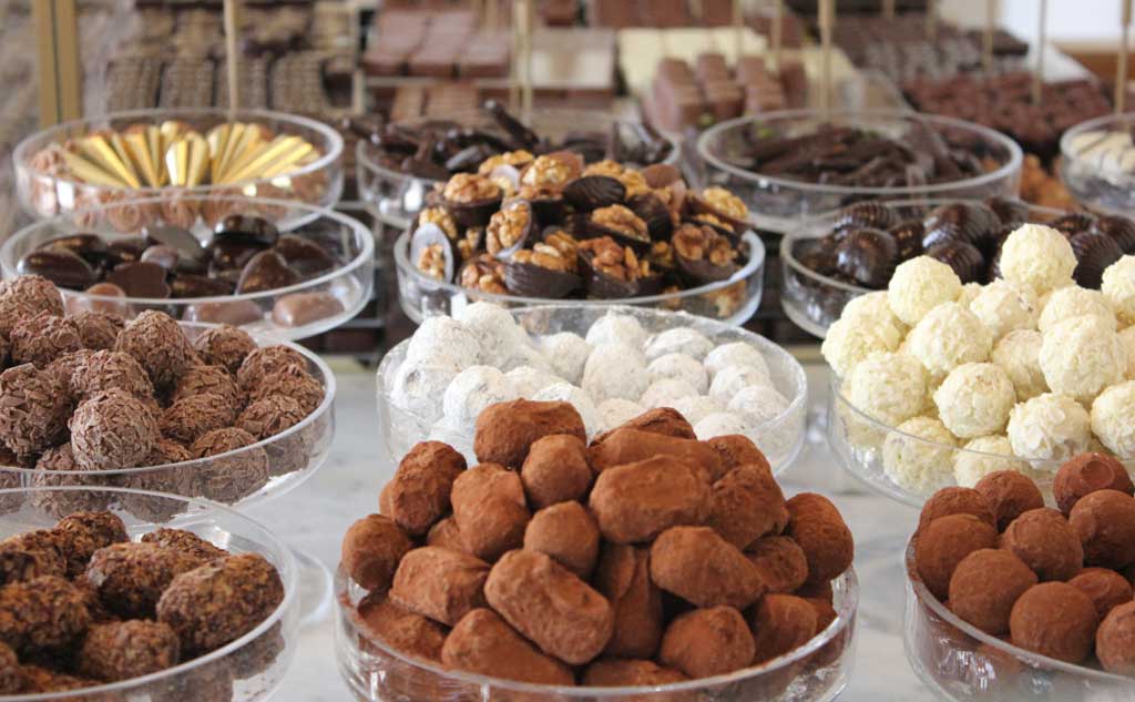 Unless you know that the parents allow the child to have candy it is probably best to avoid. Candy can be considered a bad gift idea.