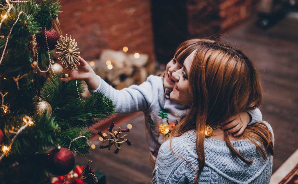 Decorating a Christmas Tree is another way to create a new tradition.