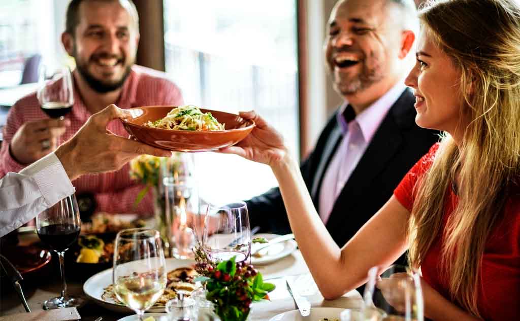 Giving a compliment is another way to get the conversation started on a positive topic.